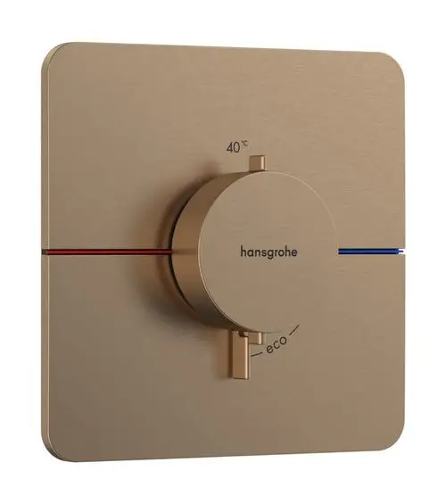 Thermostat von Hansgrohe in gebürstetem Bronze mit einem Drehknopf zur Temperatureinstellung und einem Eco-Modus, montiert auf einer quadratischen Wandplatte.